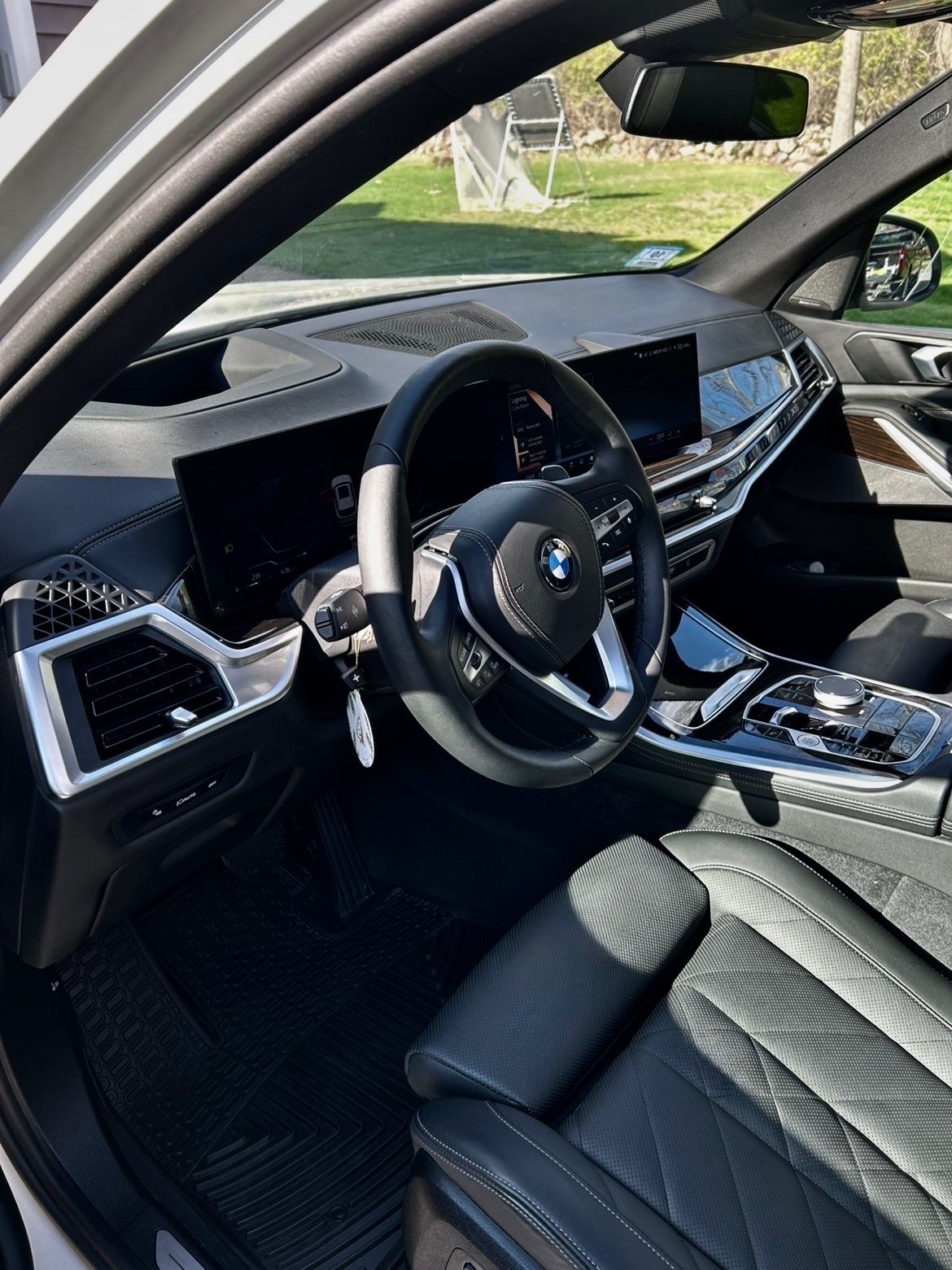 Detailed BMW interior with clean leather seats and dashboard