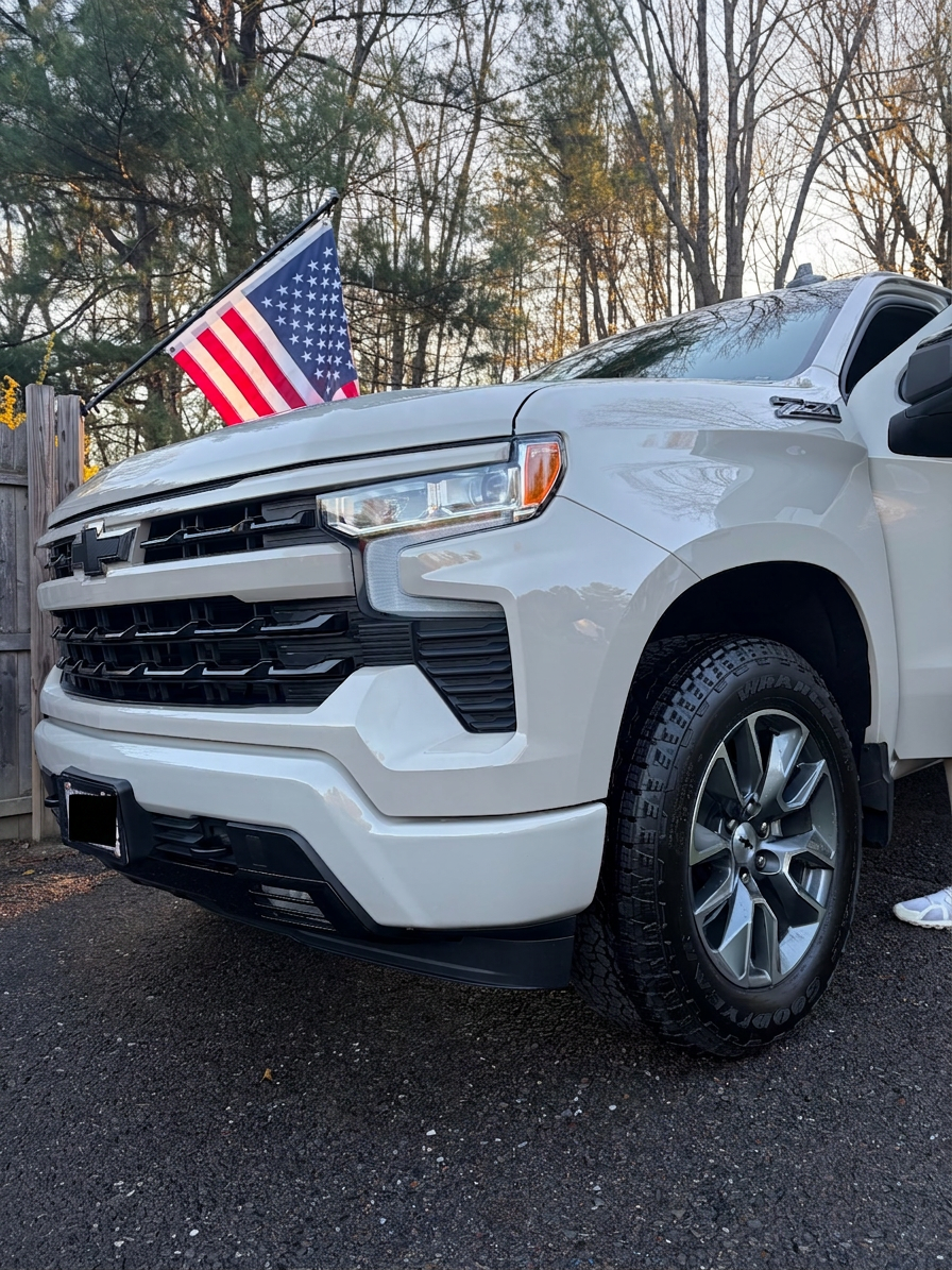 Detailed white Chevy Silverado RST front end